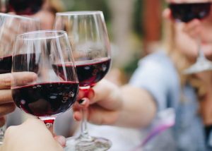 Wine glasses toasting