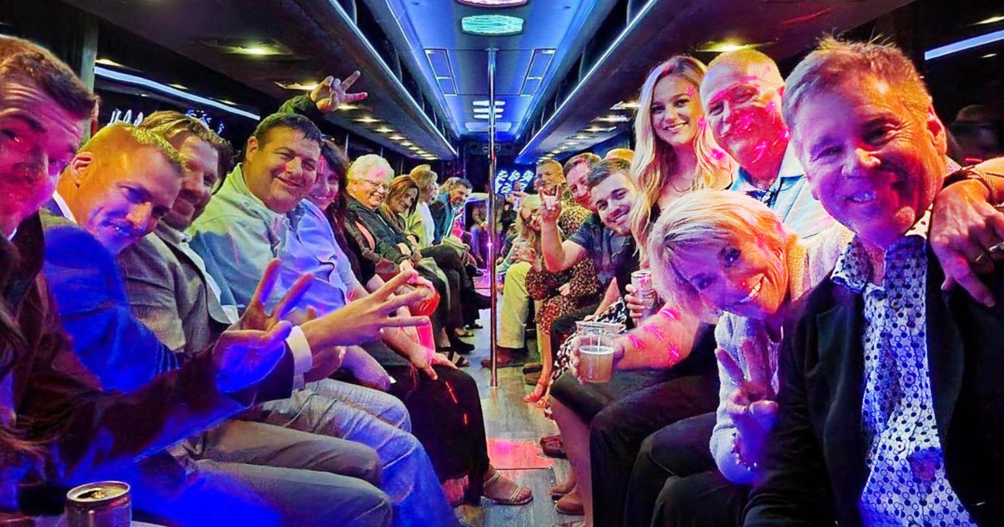 Wedding party celebrating on our party bus