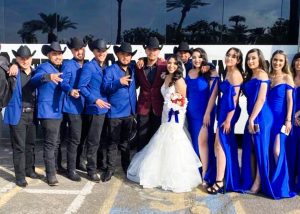 Bride and Groom party in front of party bus