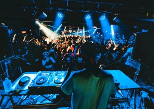 DJ and crowd in a scottsdale club