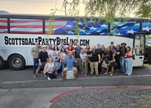 team building event in front of corporate party bus rental in Scottsdale AZ