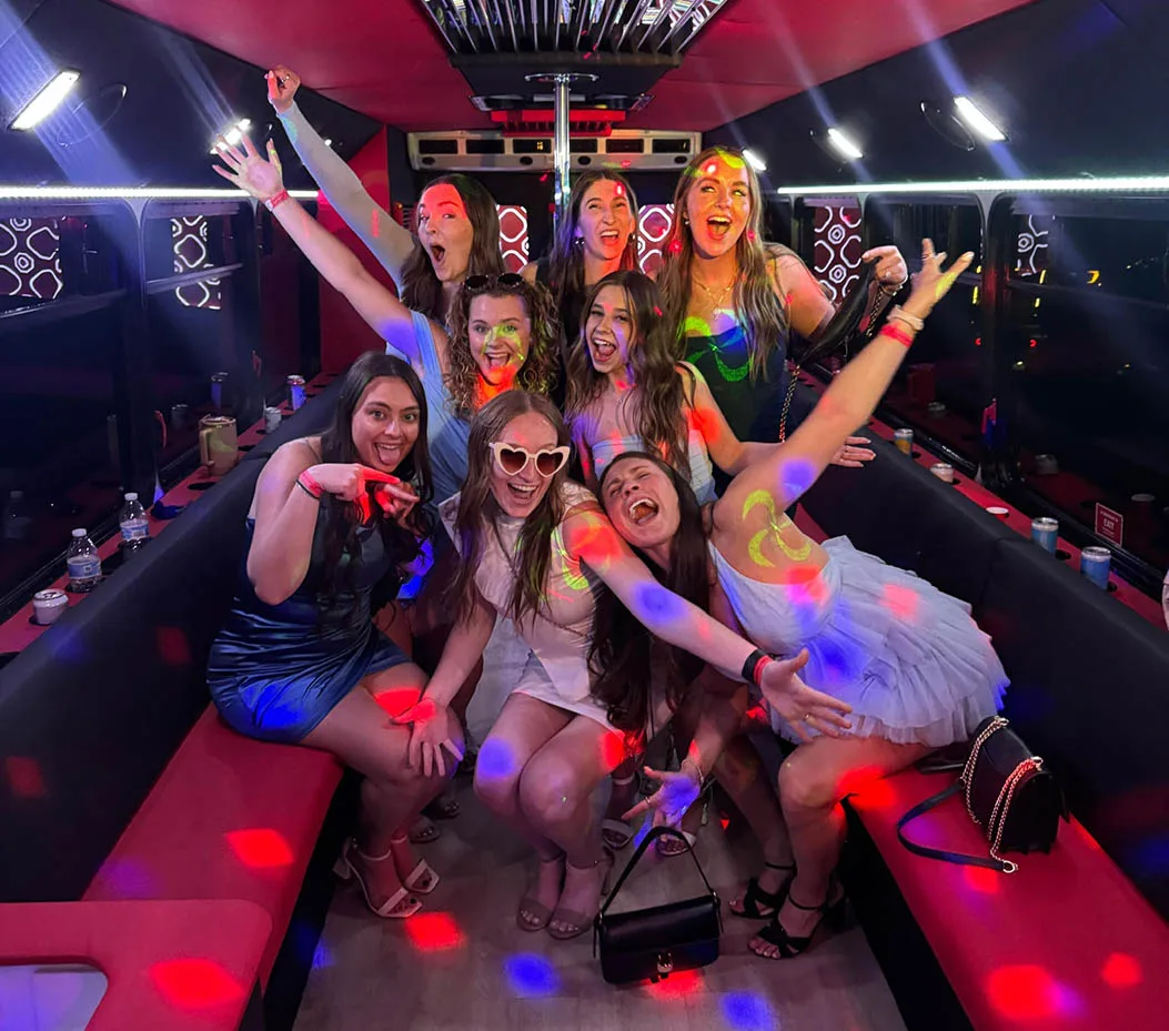 Bachelorette party group enjoying a luxury party bus experience in Old Town Scottsdale.